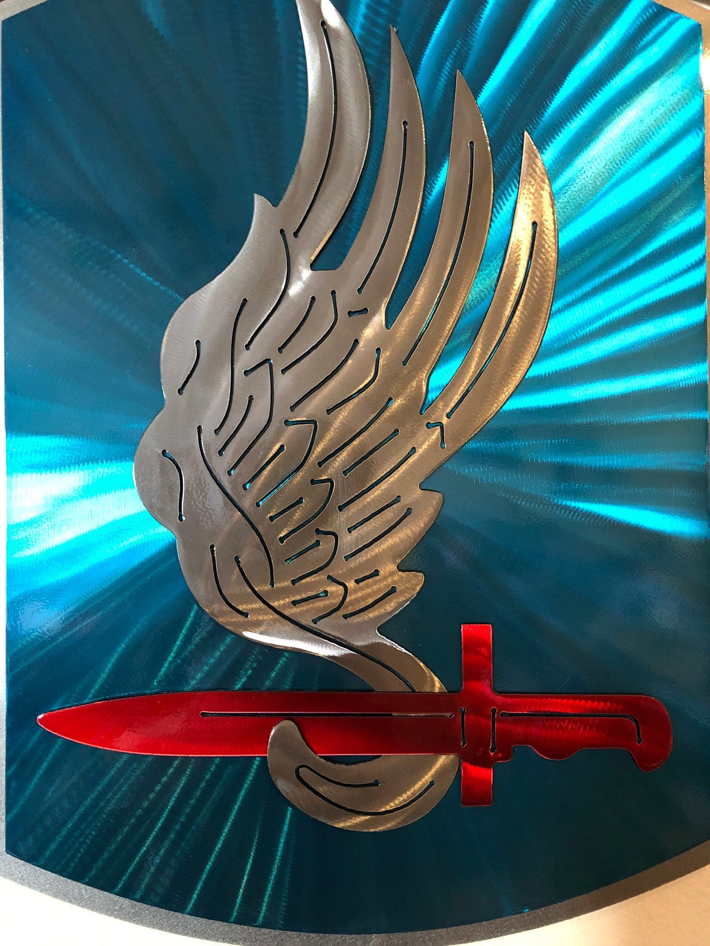 Layered metal wall art of the 173rd Airborne Brigade with candy powder coat finish.