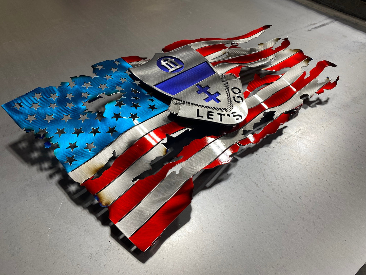 Metal tattered American flag with 325th Airborne Infantry Regiment emblem