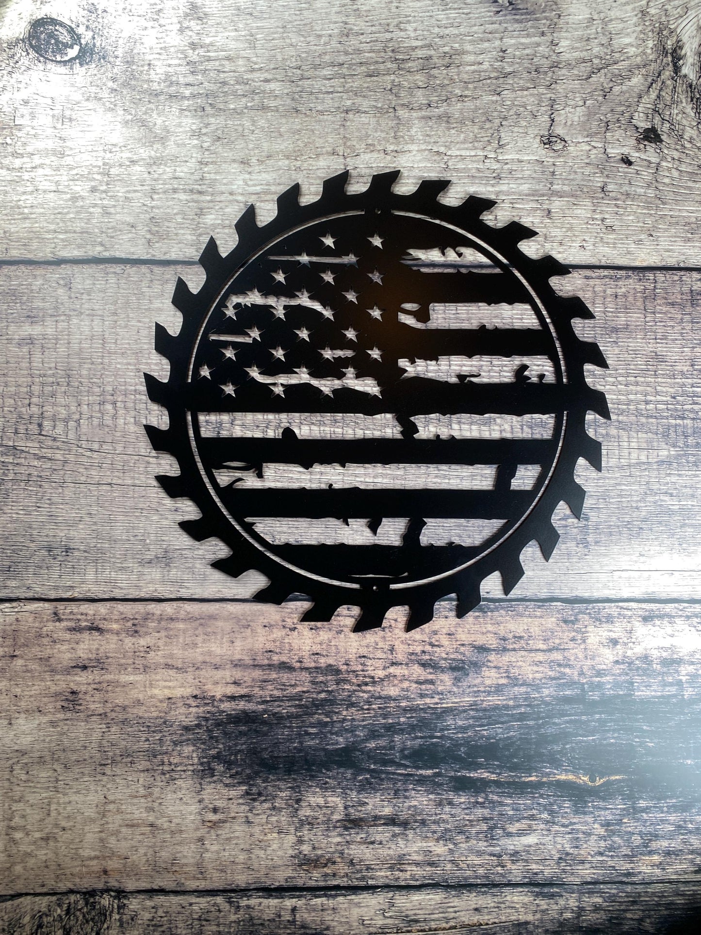 American Flag Sawblade Metal Wall Art with tattered flag design
