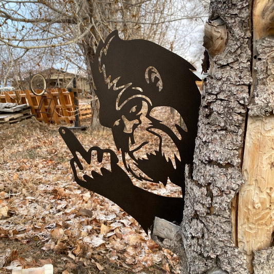 Bigfoot Flipping the Bird metal wall art in textured black and oil-rubbed bronze finish