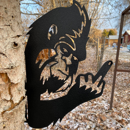 Bigfoot Flipping the Bird metal wall art in textured black and oil-rubbed bronze finish