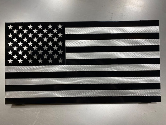 Black and silver American flag made from marine-grade aluminum with floating wall mount