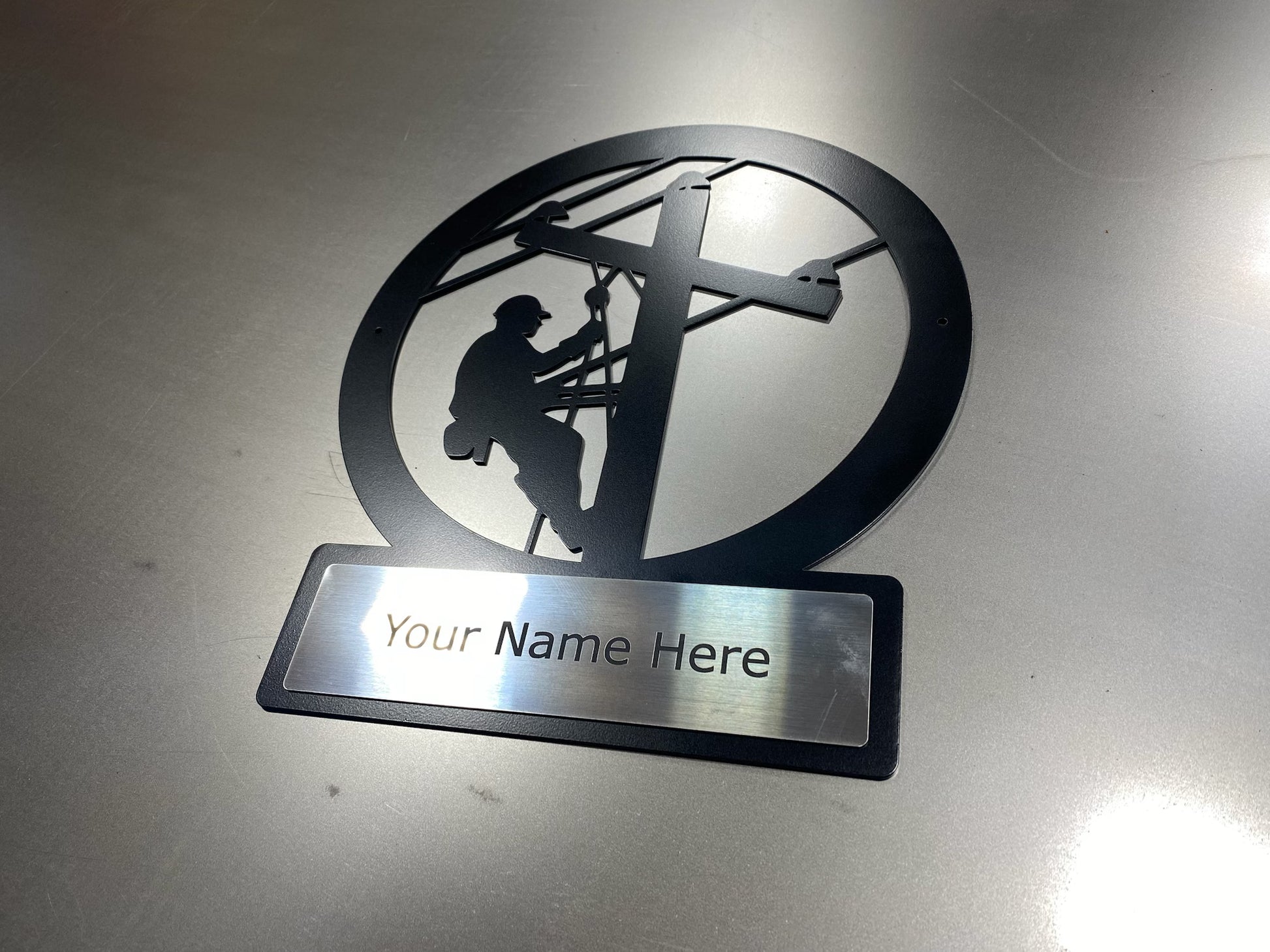 Custom lineman monogram sign in powder-coated aluminum with engraved nameplate for home or office décor