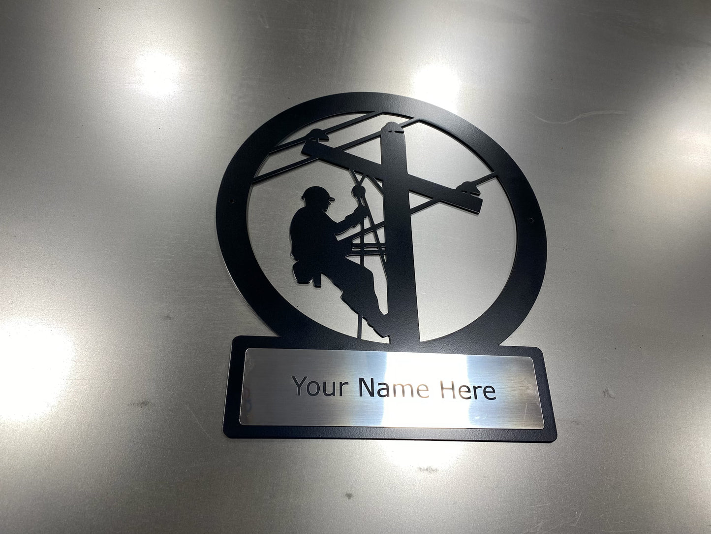 Custom lineman monogram sign in powder-coated aluminum with engraved nameplate for home or office décor