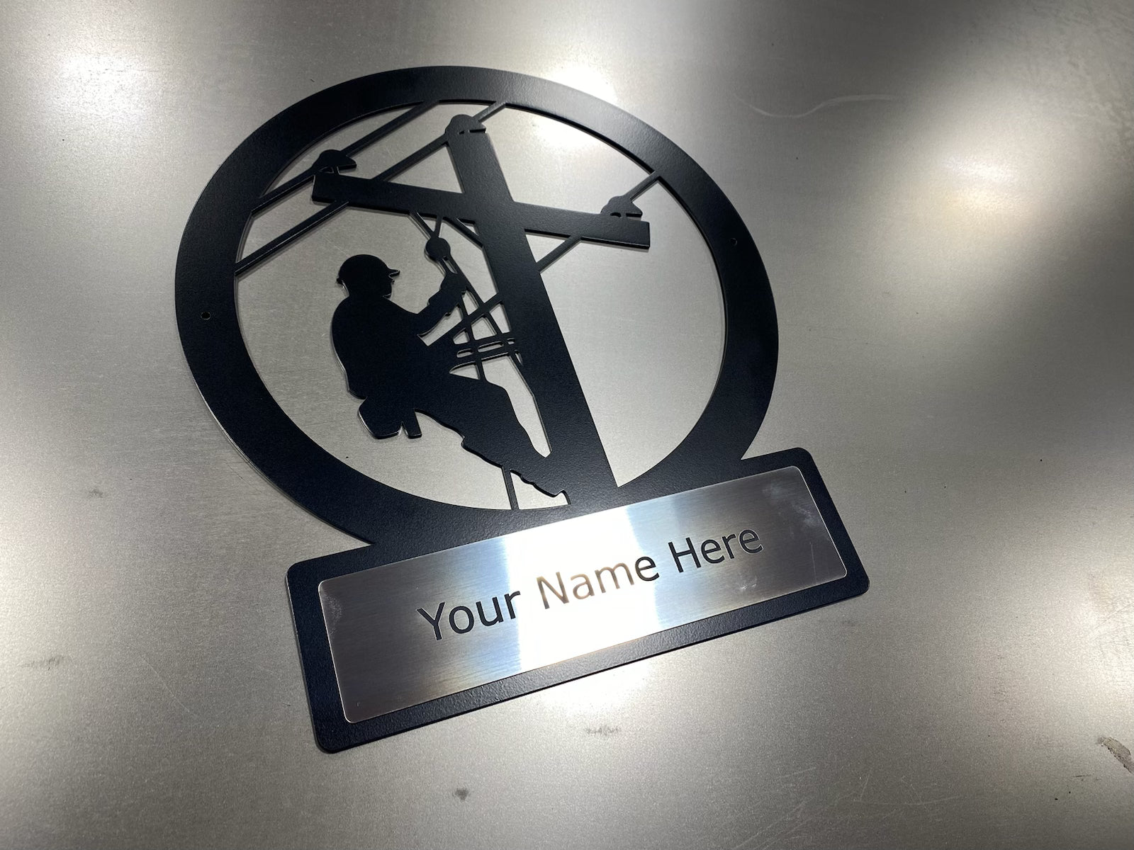 Custom lineman monogram sign in powder-coated aluminum with engraved nameplate for home or office décor