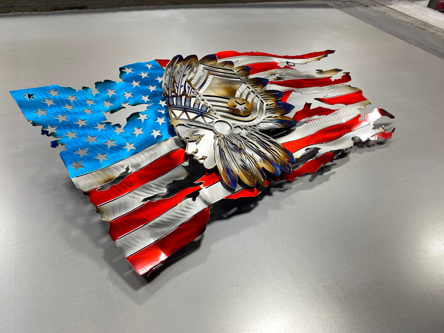 Tattered metal American flag with Female Chief Master Sergeant headdress