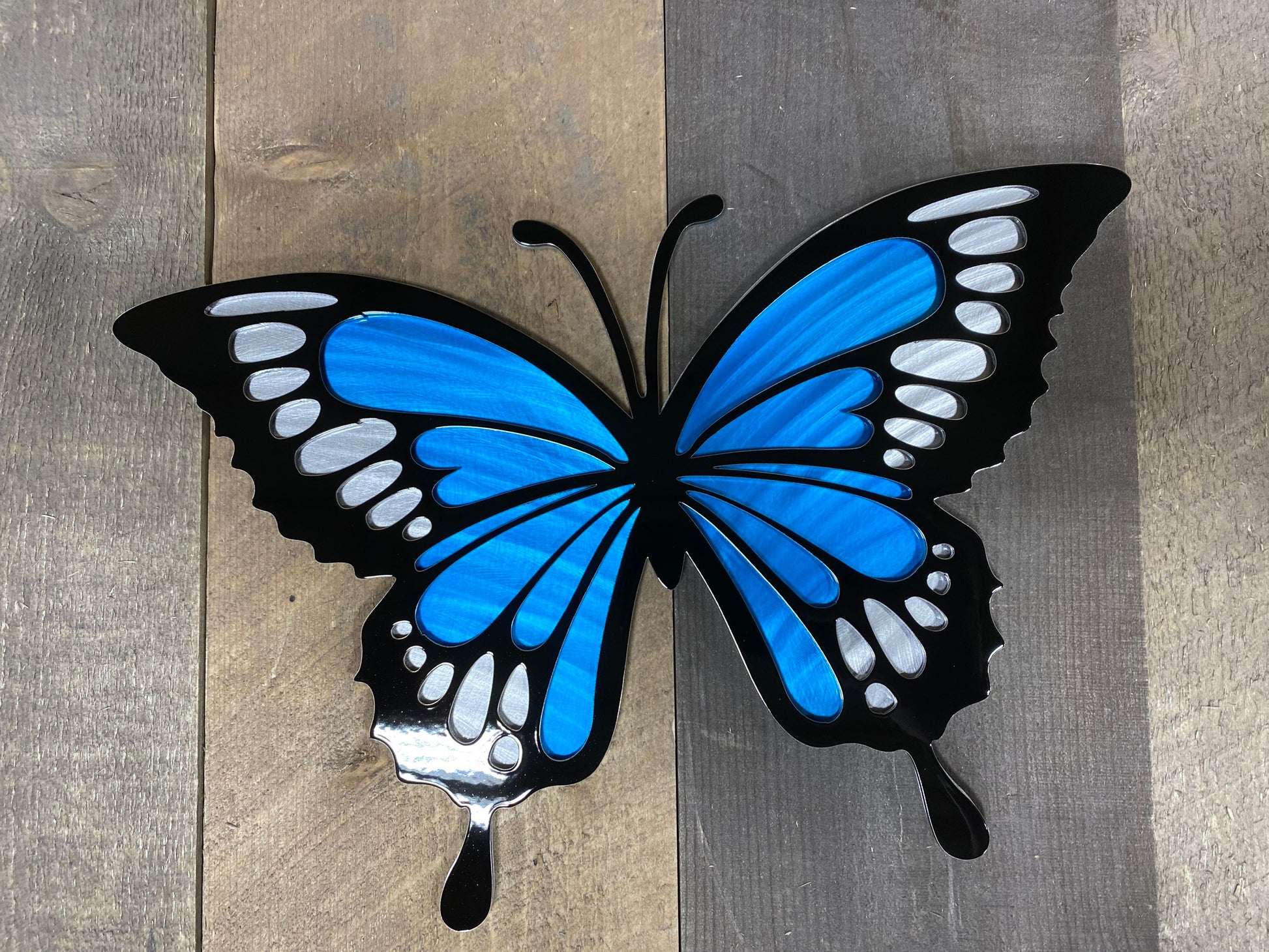 Handcrafted metal butterfly wall decor made from powder coated American steel