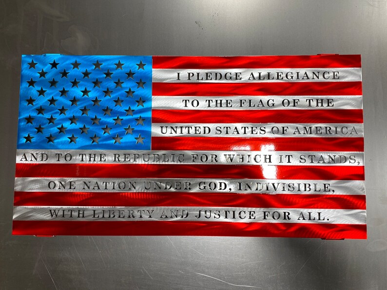 Metal American flag with Pledge of Allegiance in vibrant red, white, and blue