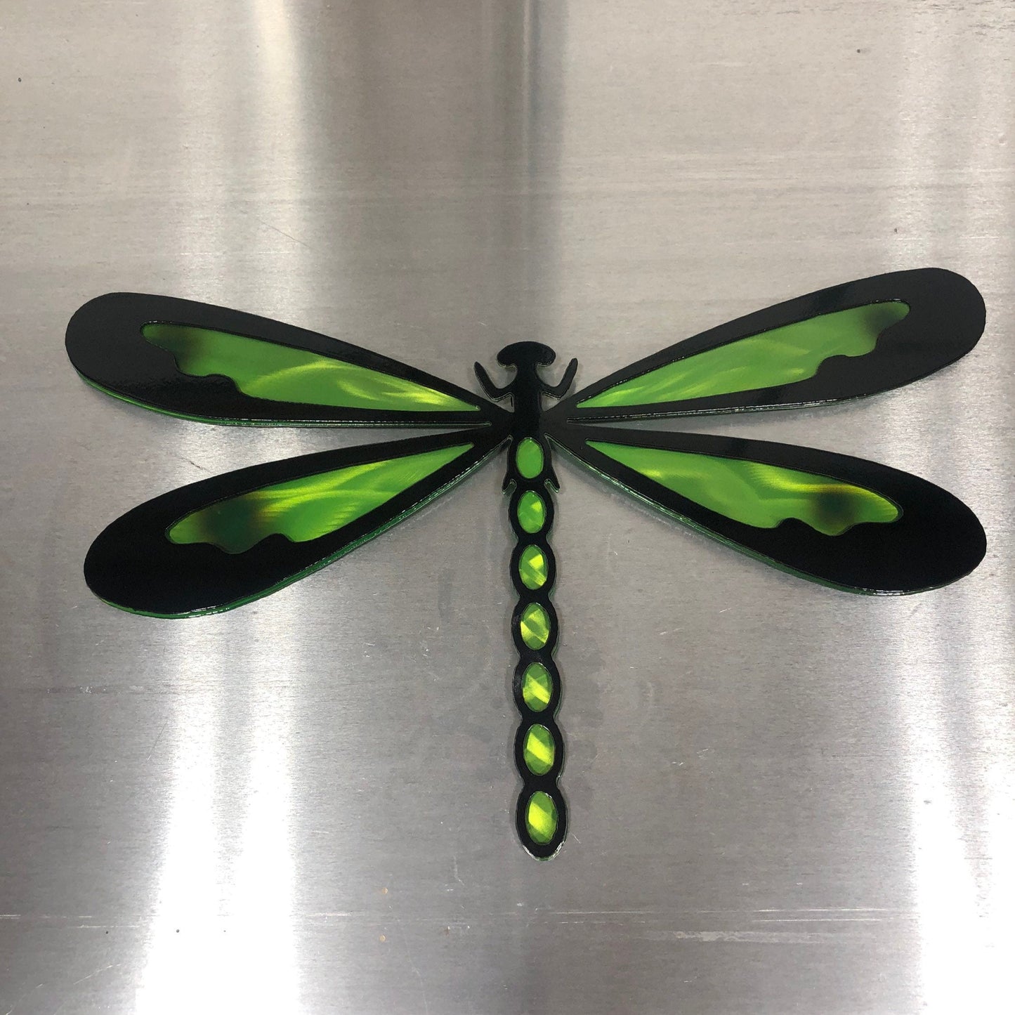 Colorful metal dragonfly wall art made from handcrafted American steel