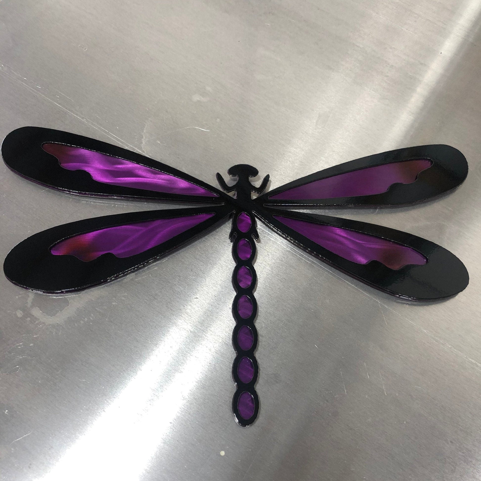 Colorful metal dragonfly wall art made from handcrafted American steel