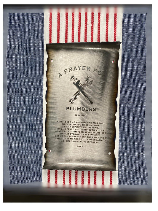 CNC cut metal Plumber’s Prayer scroll with heat patina finish and powder coat, made from American steel