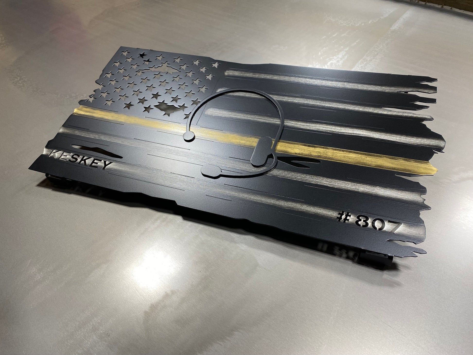 Thin Yellow Line flag honoring 911 dispatchers, made from powder coated aluminum, designed for display in homes or communication centers by CnS CnC
