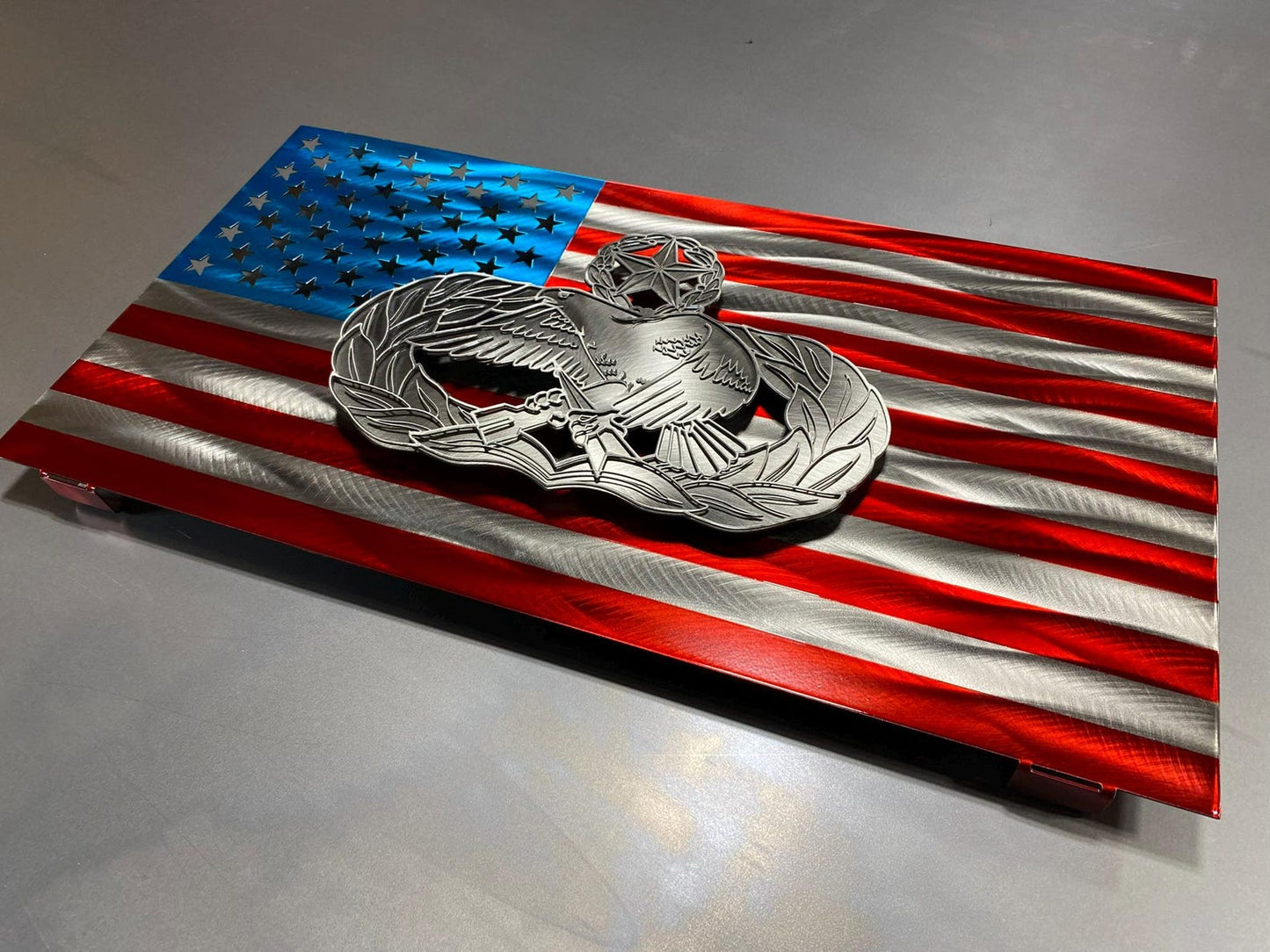 Air Force Maintenance Badge On Steel American Flag