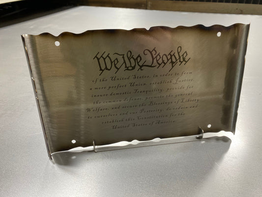 Laser engraved We The People metal sign with patriotic scrollwork