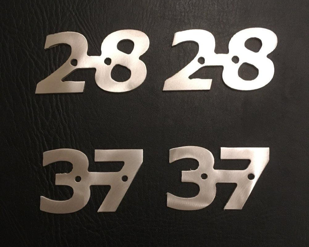 Set of two aluminum boat number markers, weather-resistant and custom-cut for marine applications.