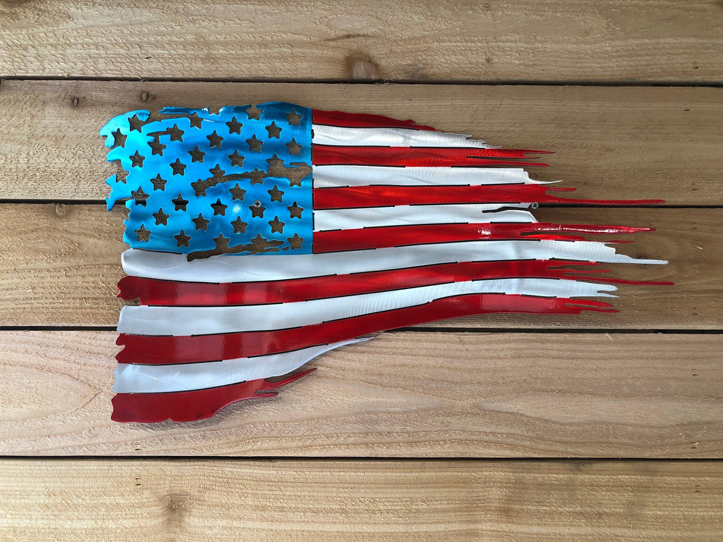 Battle worn and tattered American flag in handcrafted metal, patriotic wall art by CnS CnC