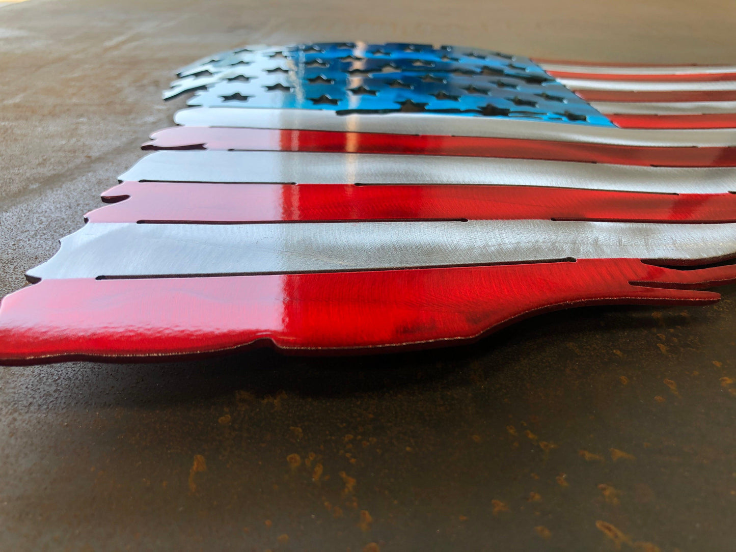 Battle worn and tattered American flag in handcrafted metal, patriotic wall art by CnS CnC