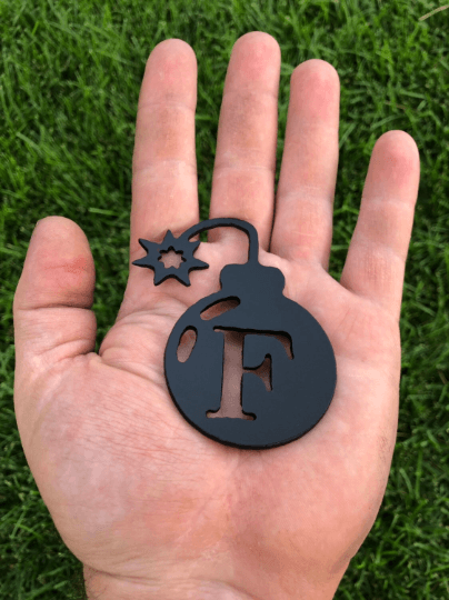 F Bomb metal gag gift, CNC cut from 14-gauge steel with a powder-coated finish. A fun EDC pocket token or desk accessory.