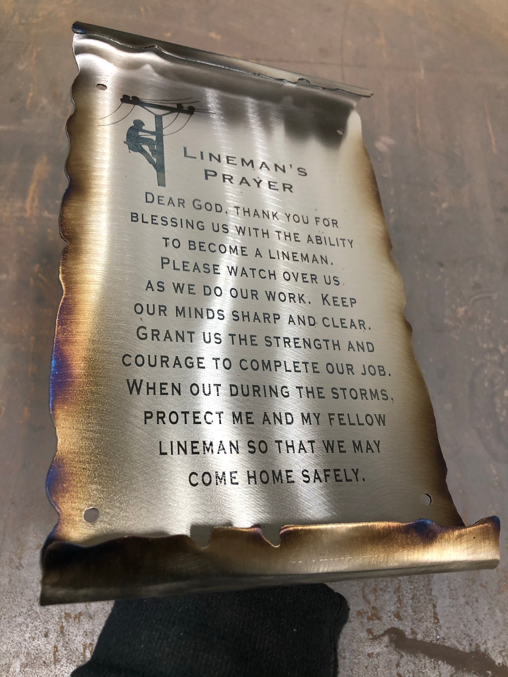 Handcrafted metal scroll with Lineman’s Prayer, formed 10-inch tall wall tribute for linemen and utility workers