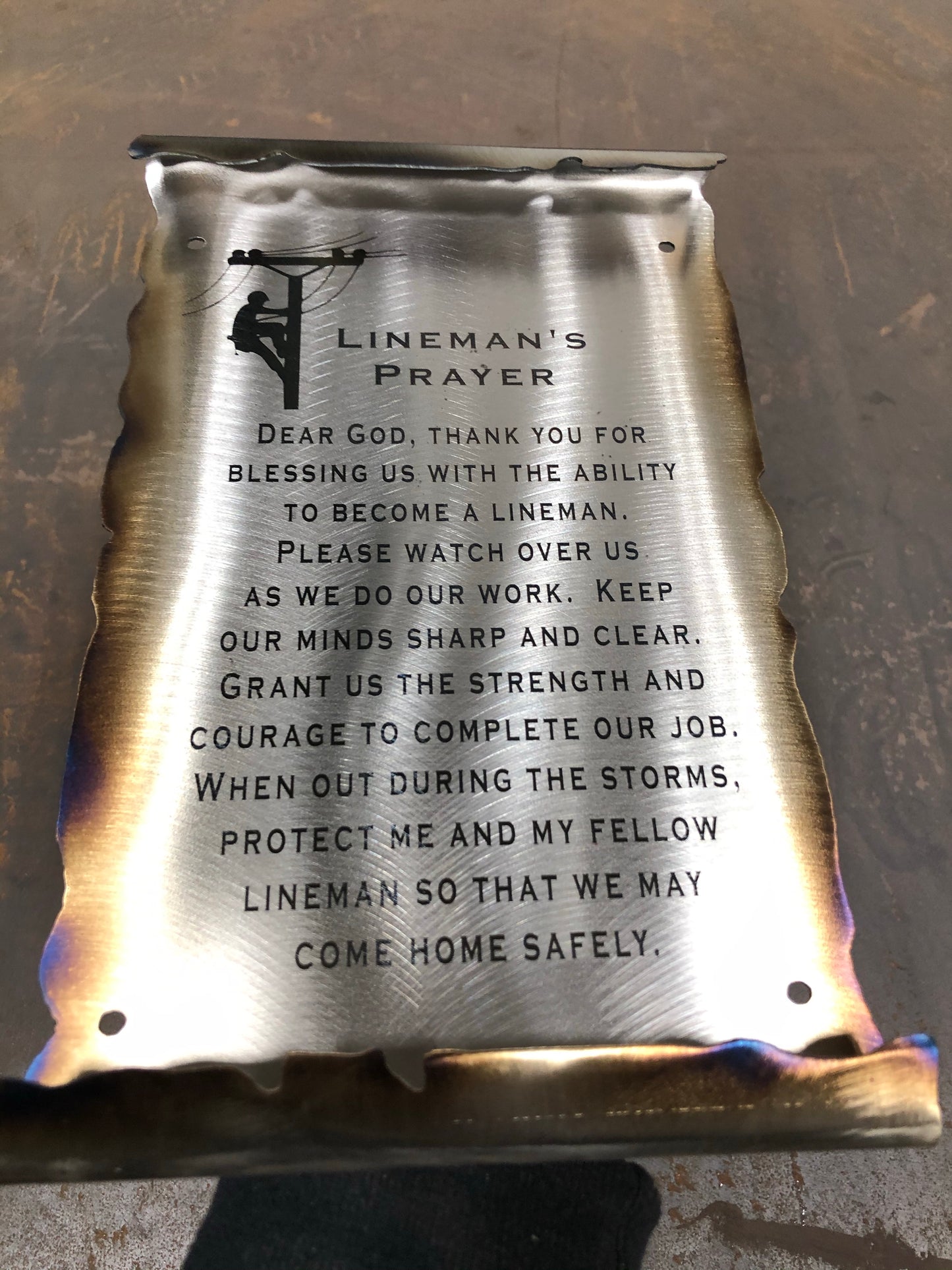 Handcrafted metal scroll with Lineman’s Prayer, formed 10-inch tall wall tribute for linemen and utility workers