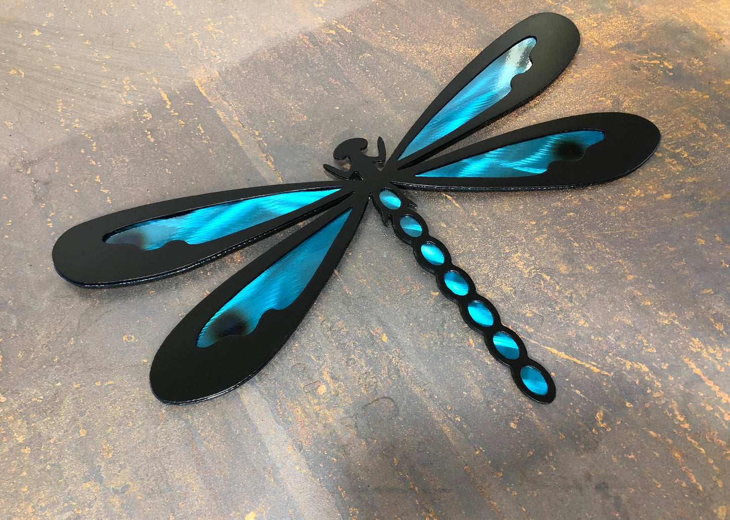 Colorful metal dragonfly wall art made from handcrafted American steel