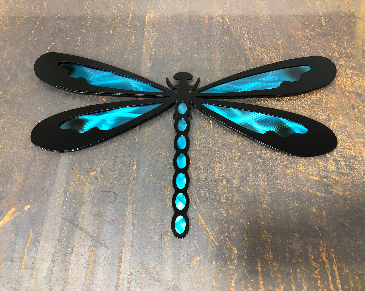 Colorful metal dragonfly wall art made from handcrafted American steel