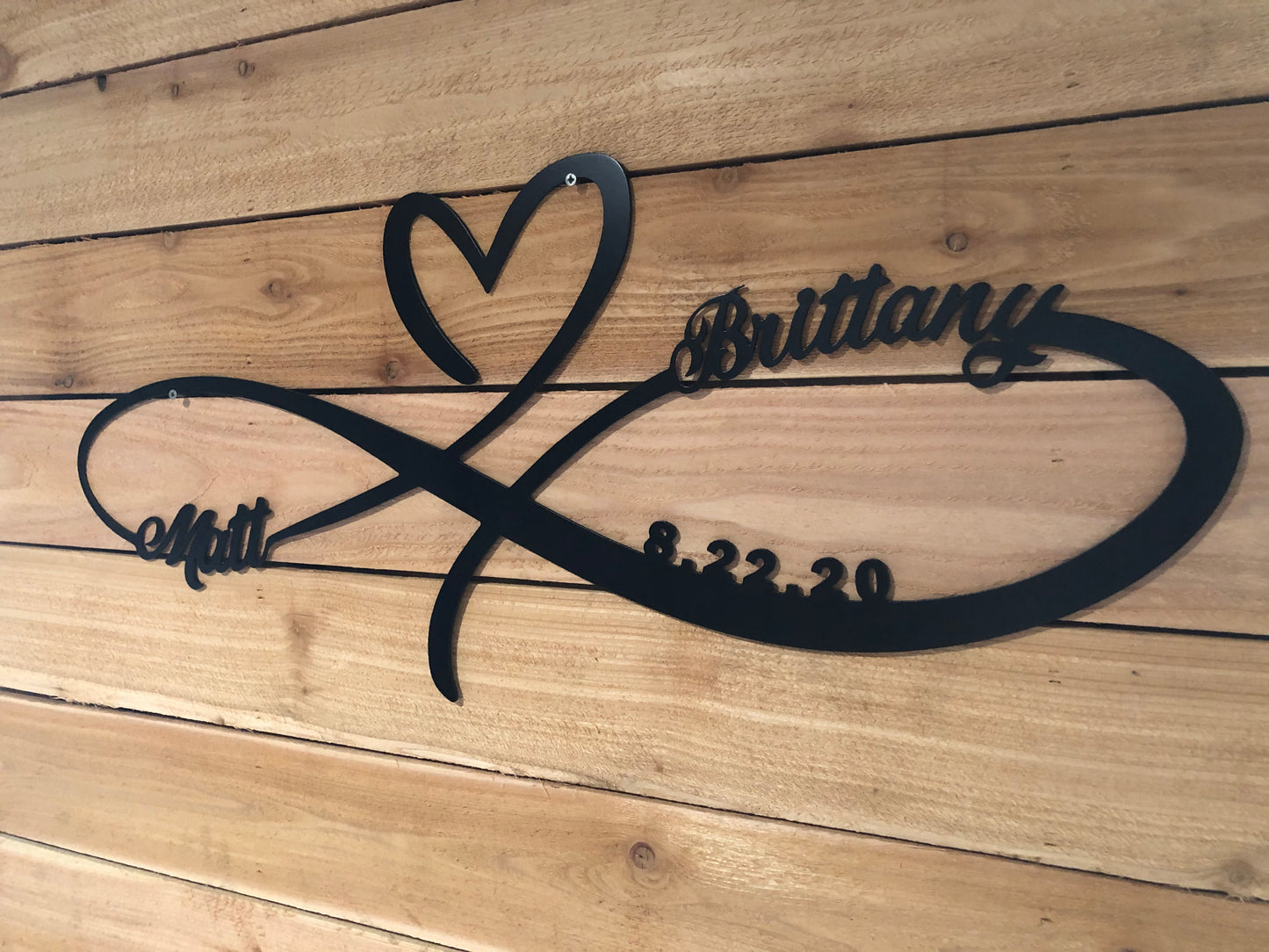 Personalized Infinity Heart, handcrafted from aluminum with custom names and wedding date, and powder-coated