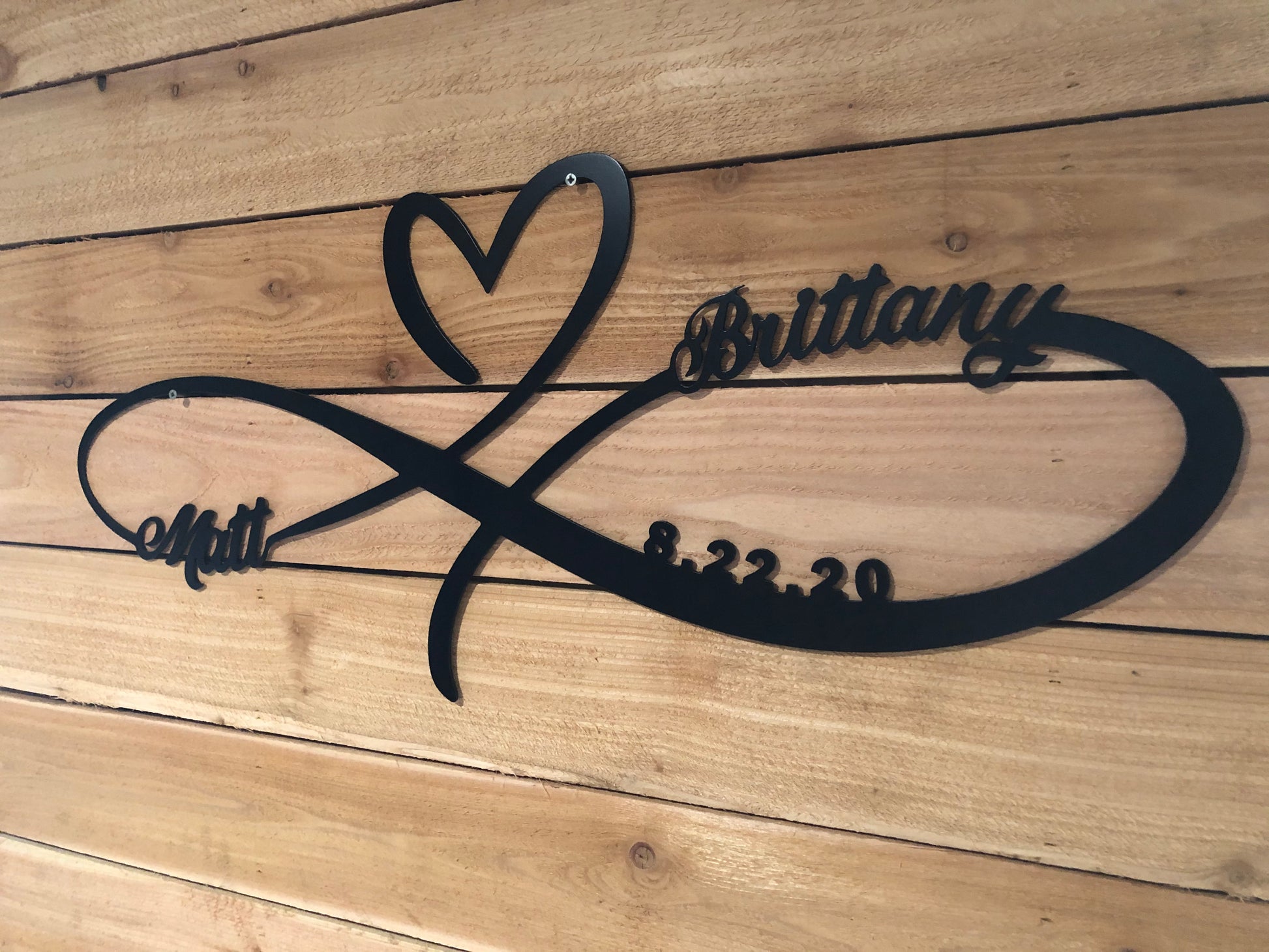 Personalized Infinity Heart, handcrafted from aluminum with custom names and wedding date, and powder-coated