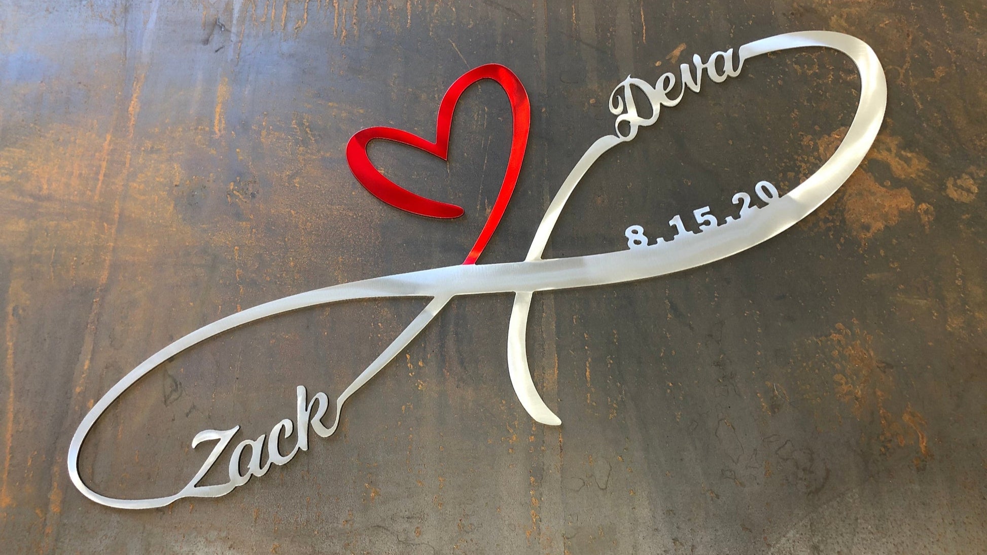Personalized Infinity Heart, handcrafted from aluminum with custom names and wedding date, and powder-coated