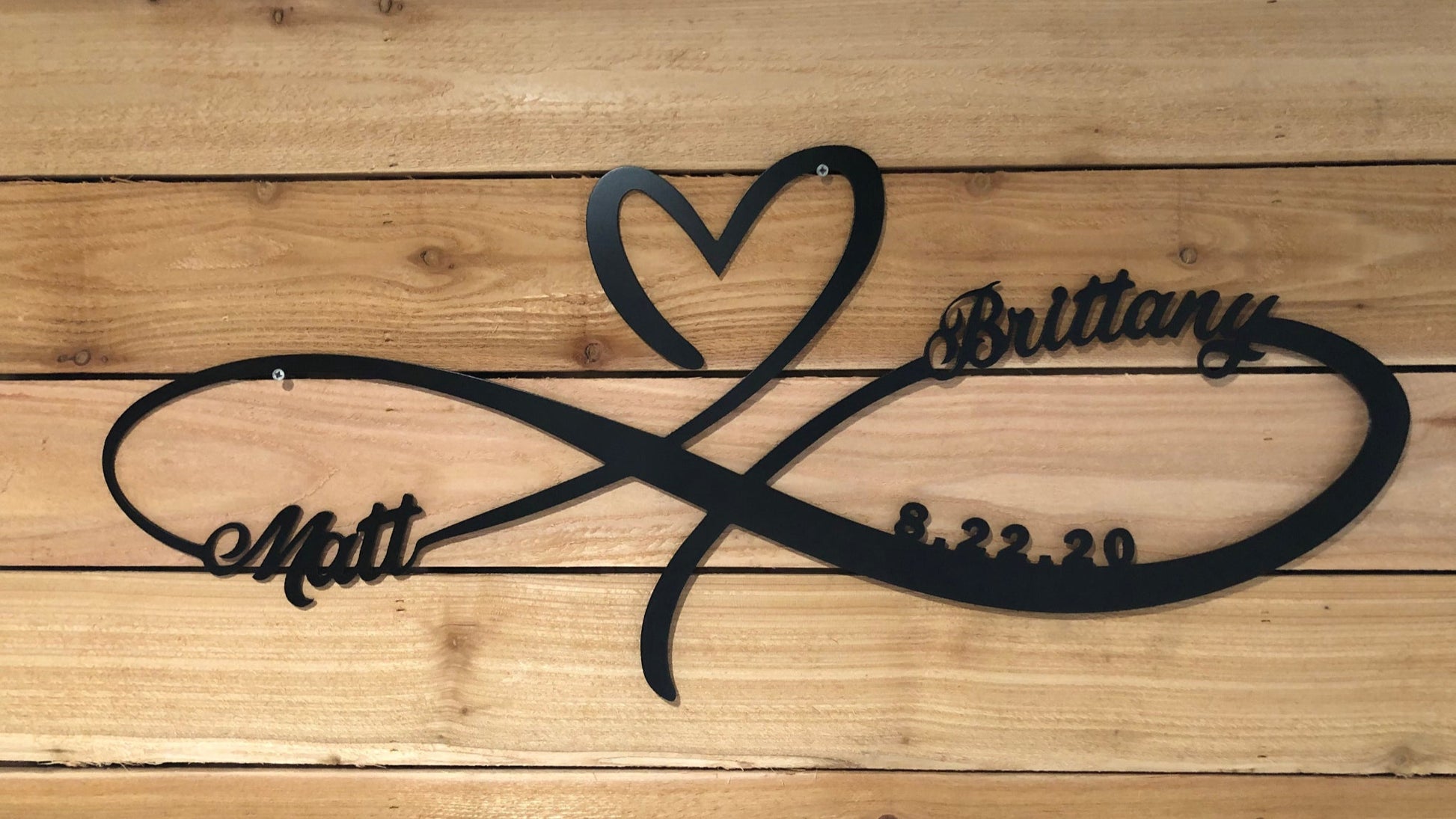 Personalized Infinity Heart, handcrafted from aluminum with custom names and wedding date, and powder-coated