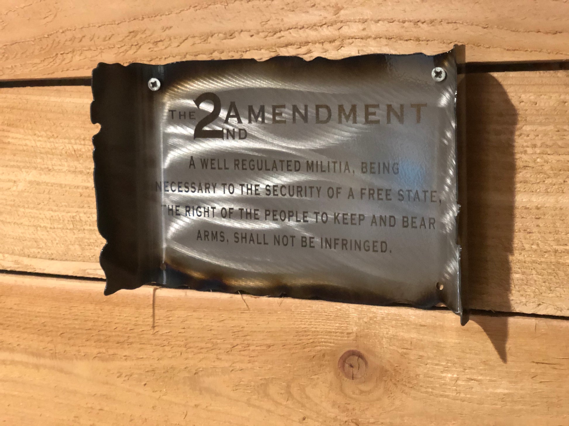 Second Amendment metal scroll sign engraved on brushed American steel with annealed text, heat patina, and powder coat finish by CnS CnC