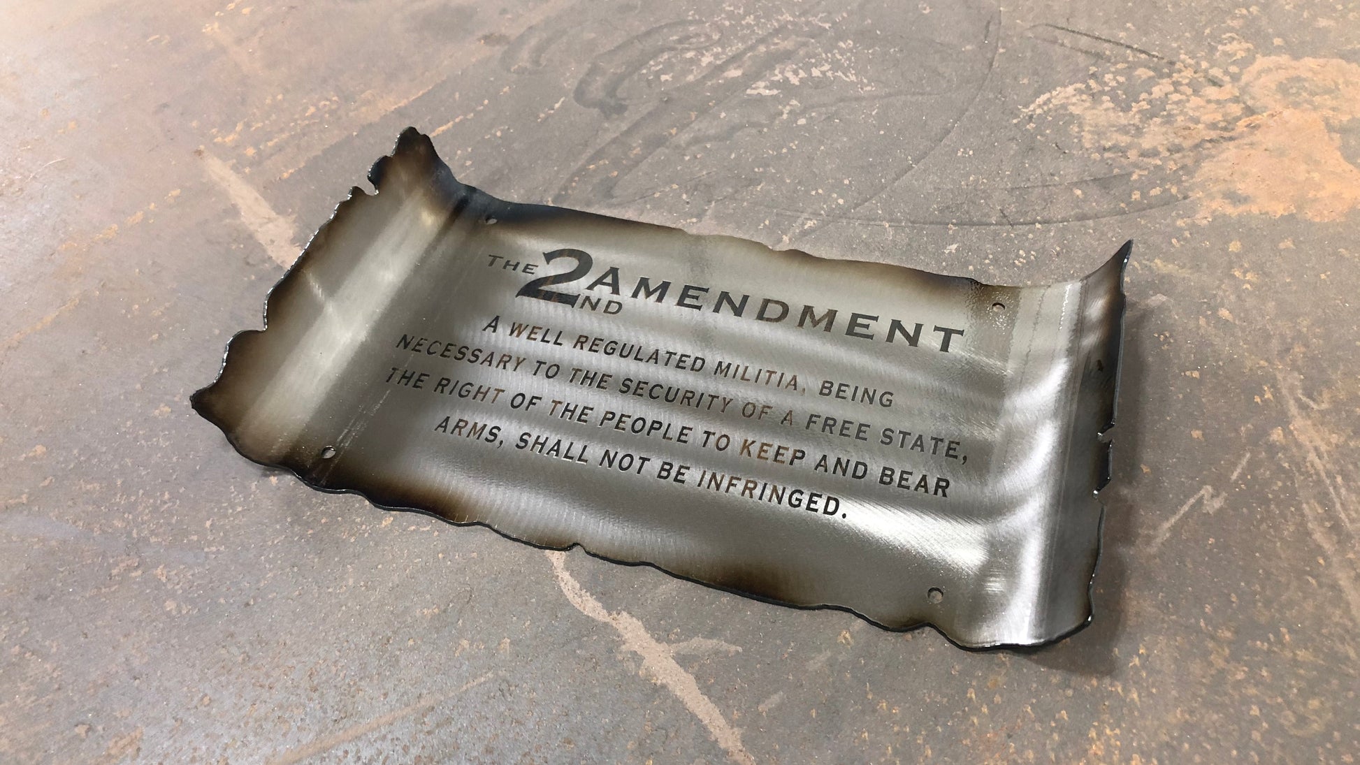 Second Amendment metal scroll sign engraved on brushed American steel with annealed text, heat patina, and powder coat finish by CnS CnC