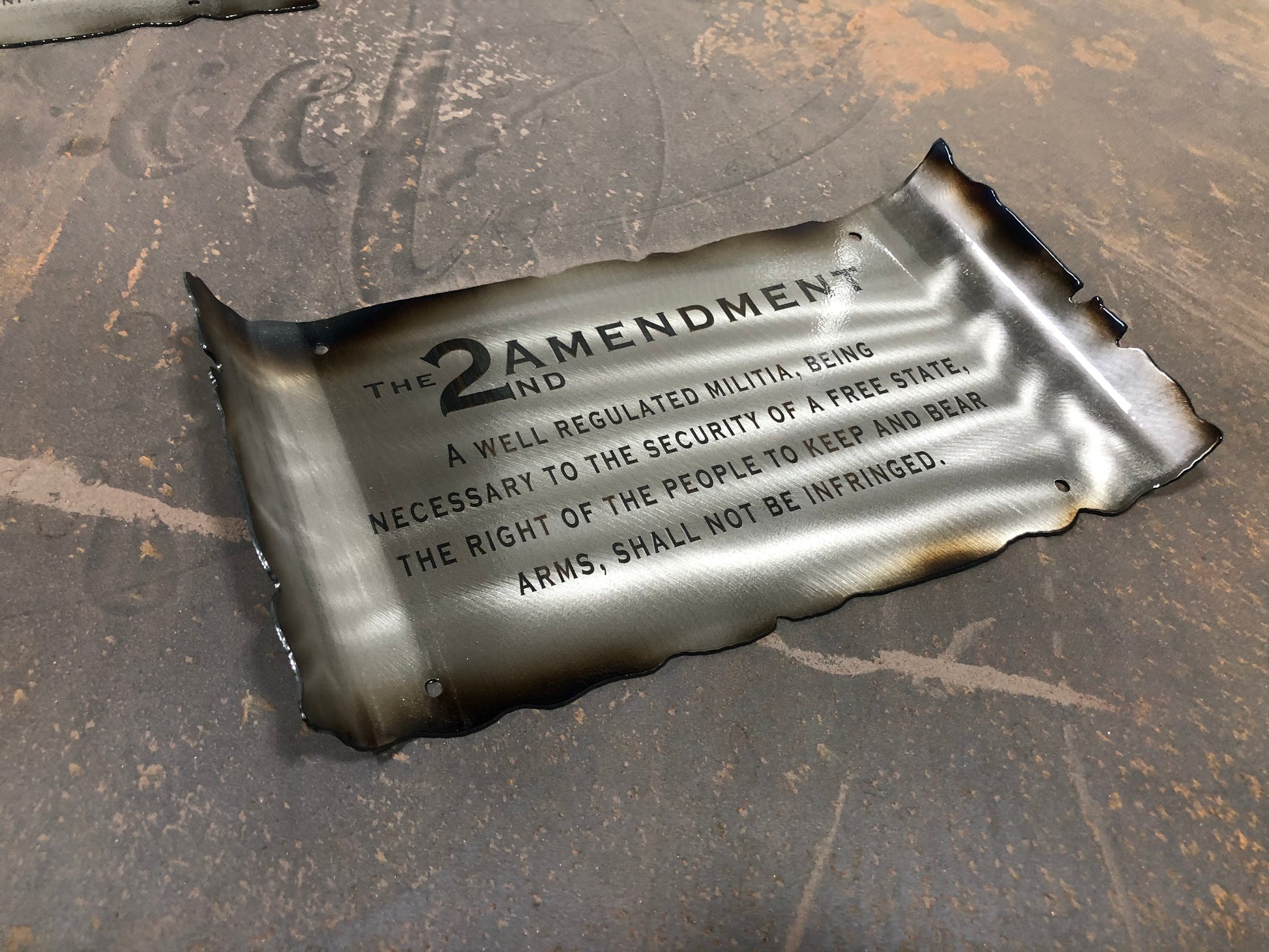 Second Amendment metal scroll sign engraved on brushed American steel with annealed text, heat patina, and powder coat finish by CnS CnC