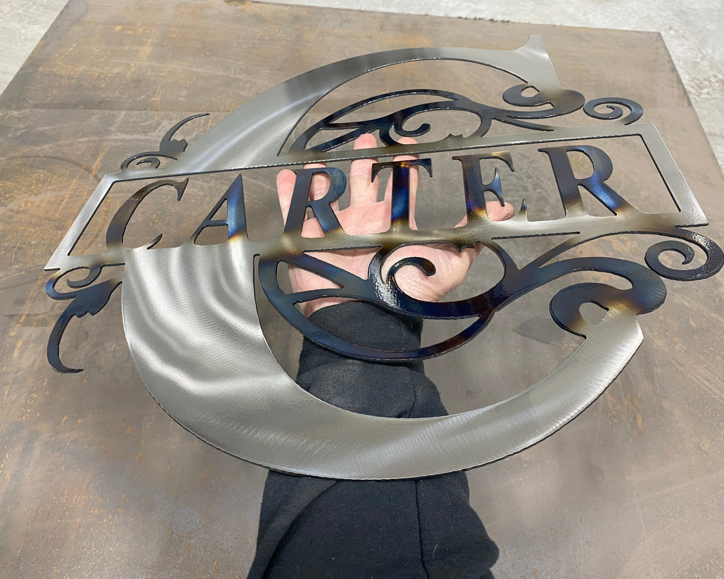 Split Letter Monogram, handcrafted metal family name sign with a heat-treated finish, personalized design, and clear powder coat by CnS CnC.