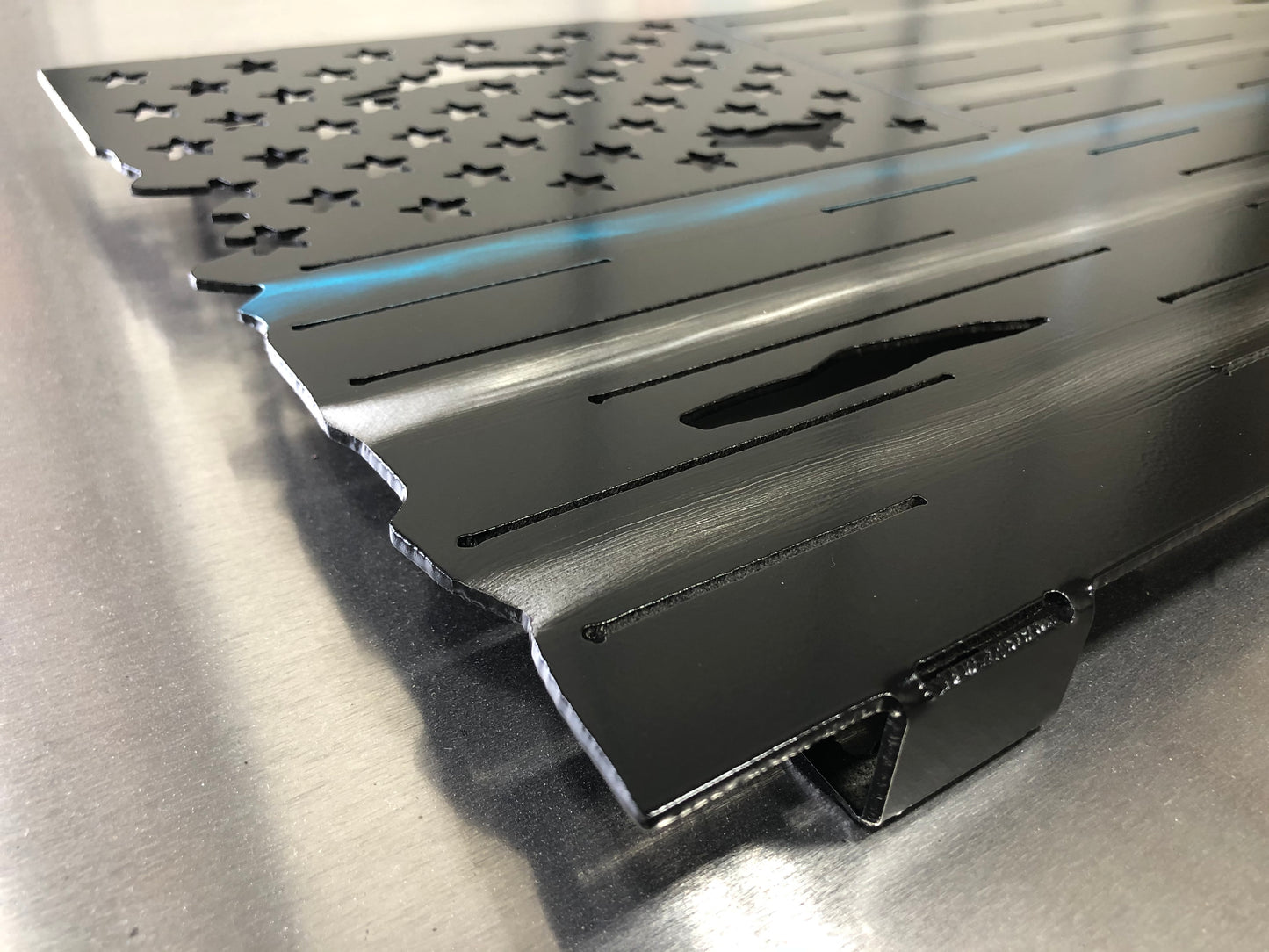 Thin Blue Line Distressed American Flag made from marine-grade aluminum with a weather-resistant finish, designed for police officers and law enforcement.