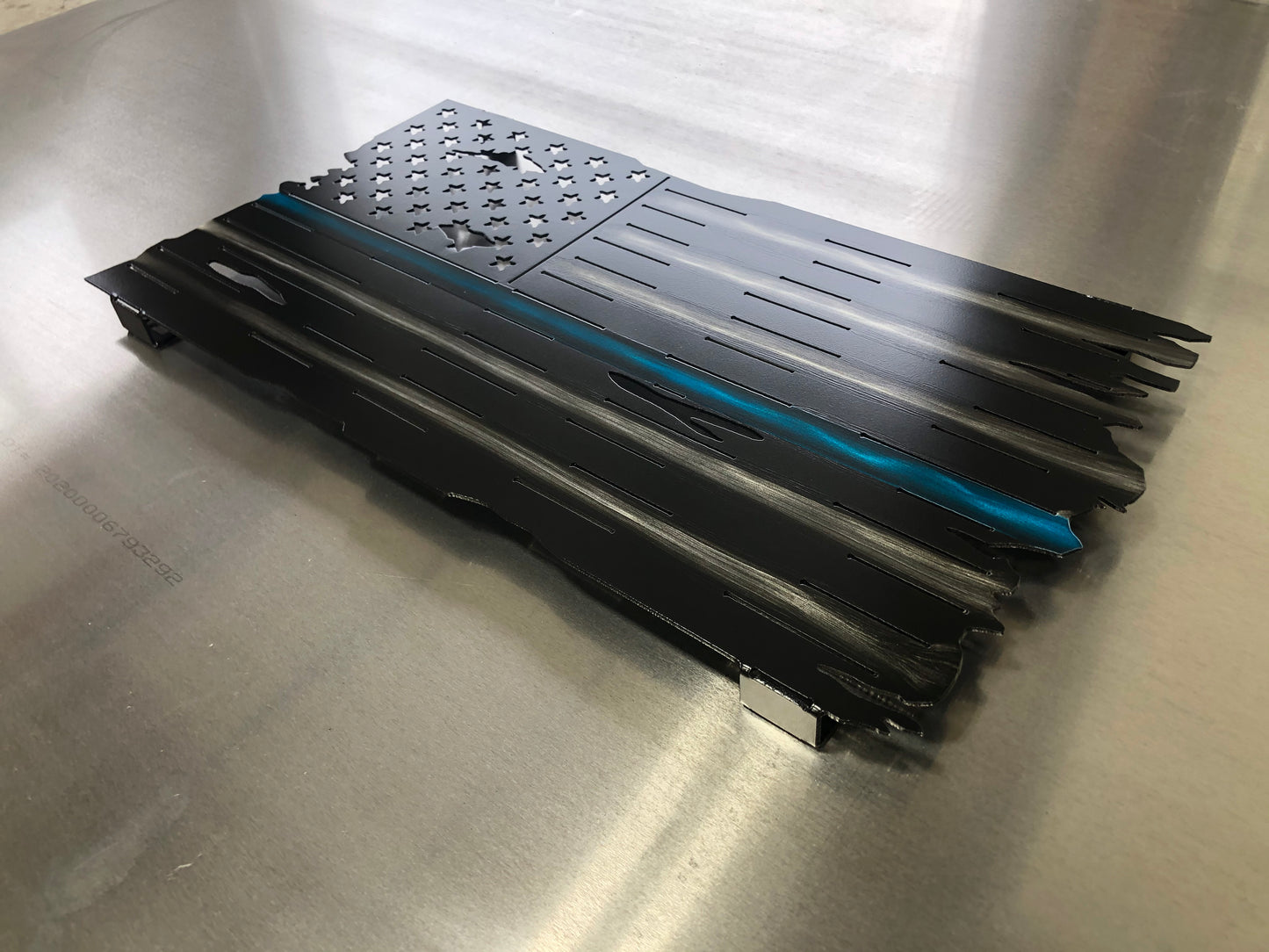 Thin Blue Line Distressed American Flag made from marine-grade aluminum with a weather-resistant finish, designed for police officers and law enforcement.