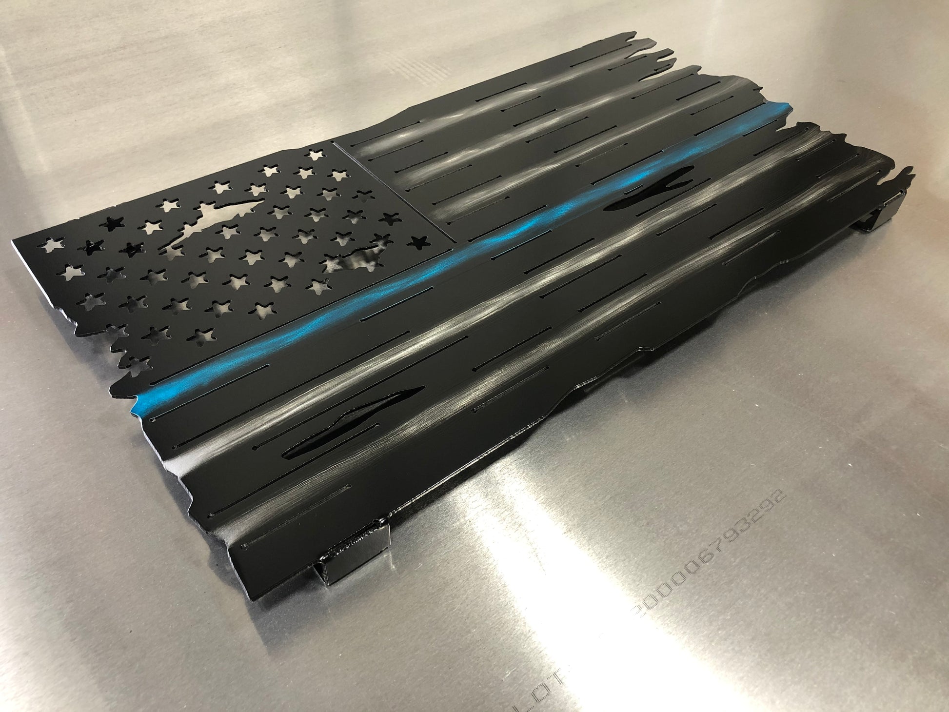 Thin Blue Line Distressed American Flag made from marine-grade aluminum with a weather-resistant finish, designed for police officers and law enforcement.