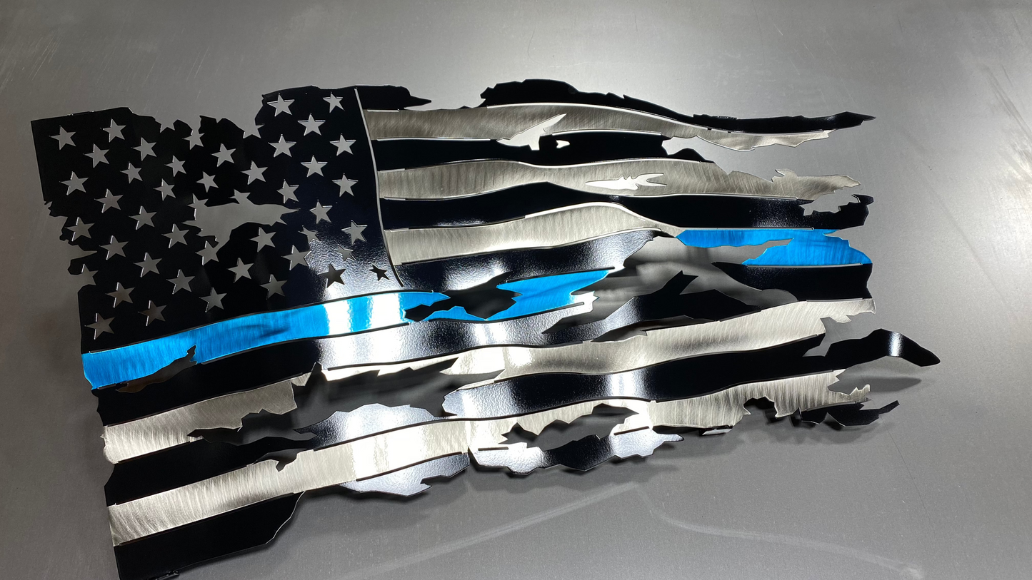 Thin Blue Line wavy metal flag, hand-formed with a three-stage powder-coated finish, measuring 24 inches wide.