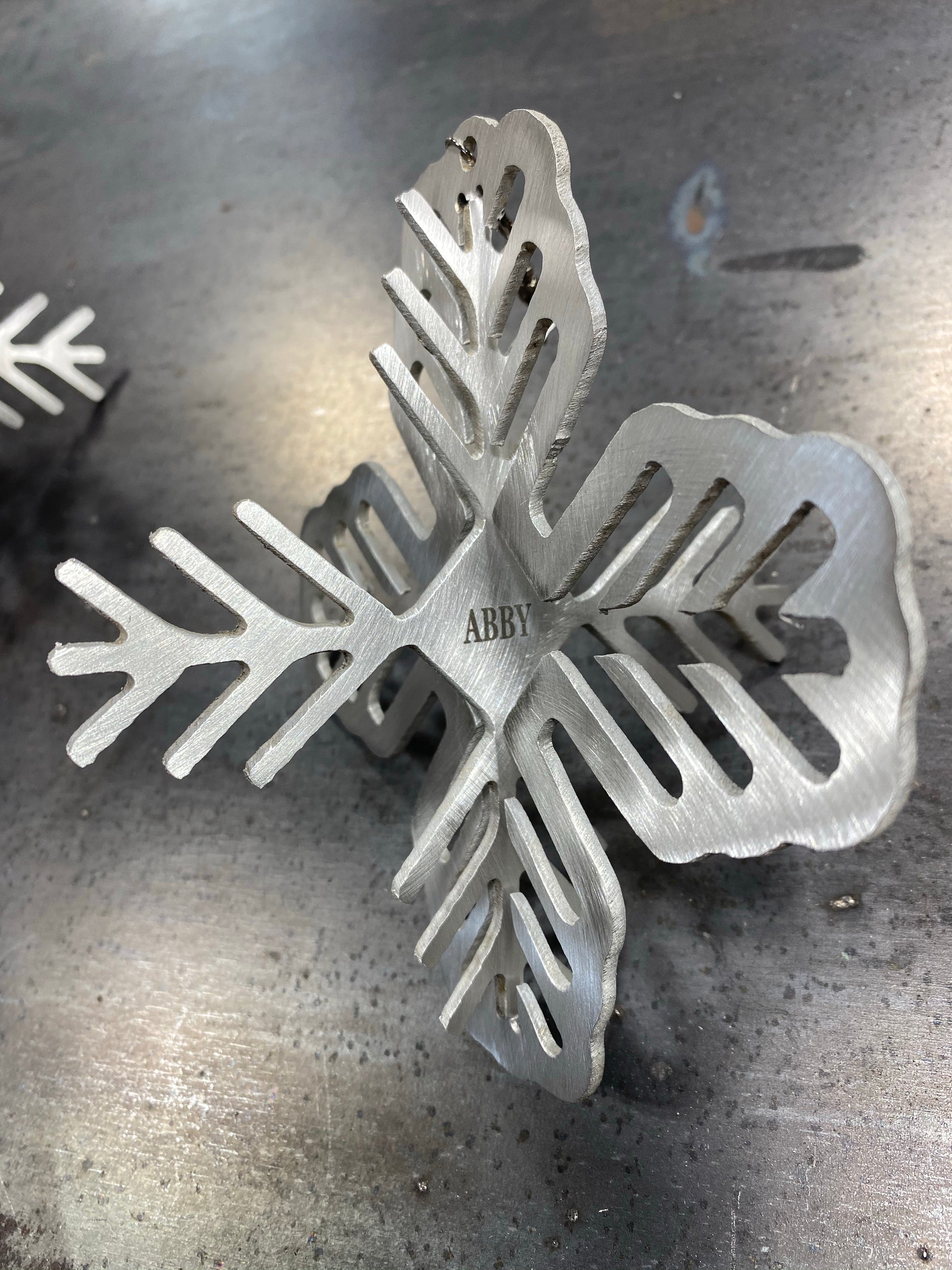Personalized Aluminum Snowflake, handcrafted 3D metal ornament with laser-engraved name and clear powder coat finish