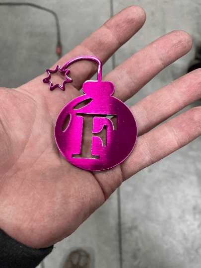 F Bomb metal gag gift, CNC cut from 14-gauge steel with a powder-coated finish. A fun EDC pocket token or desk accessory.