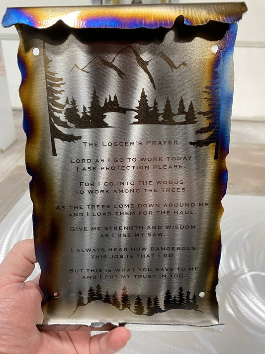 Loggers Prayer Scroll Sign, handcrafted metal wall art with laser-etched tree line and prayer, heat patina accents, and scroll edges by CnS CnC.