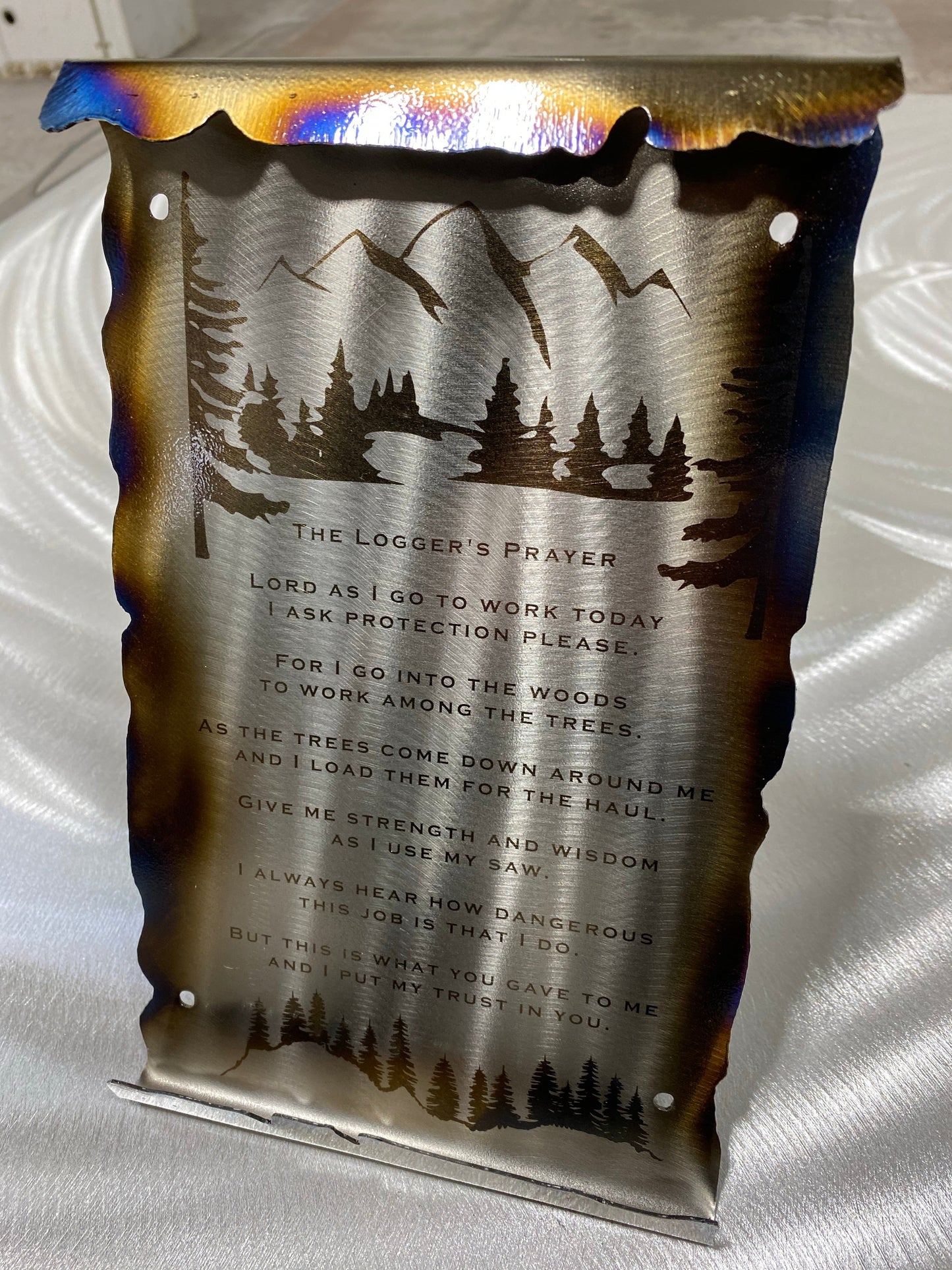  Loggers Prayer Scroll Sign, handcrafted metal wall art with laser-etched tree line and prayer, heat patina accents, and scroll edges by CnS CnC.