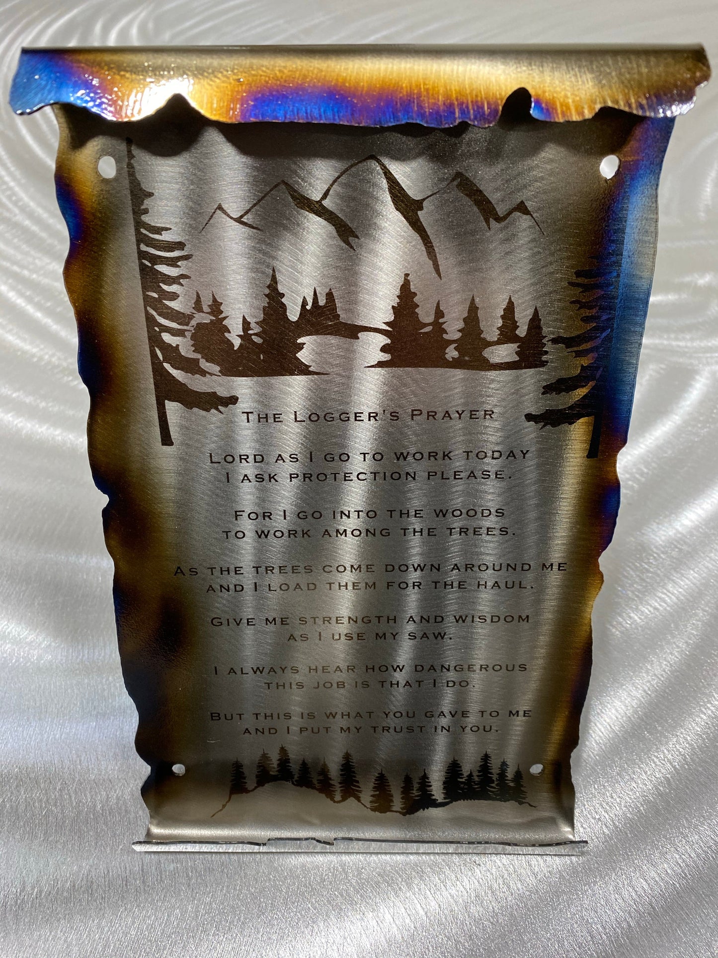 Loggers Prayer Scroll Sign, handcrafted metal wall art with laser-etched tree line and prayer, heat patina accents, and scroll edges by CnS CnC.