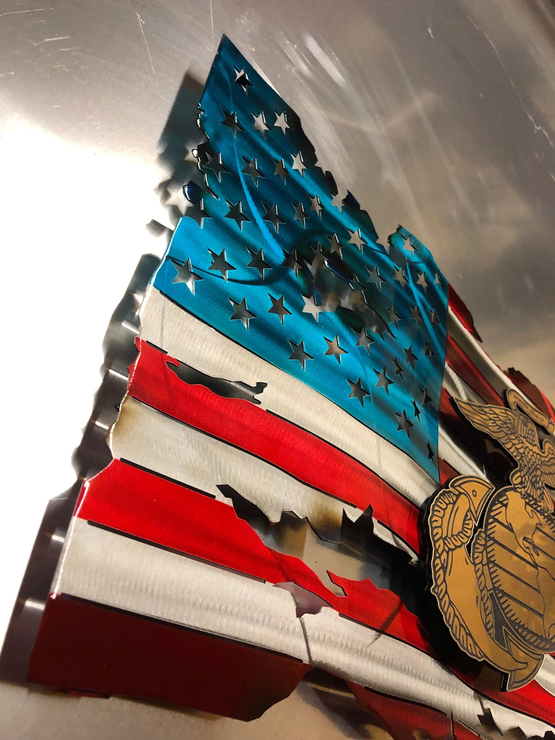 Marine Corps Premium Metal Flag with floating laser-engraved USMC insignia, powder-coated and detailed with hand-formed waves.