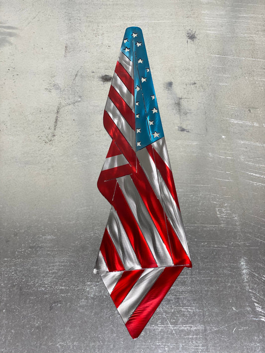 Metal Draped American Flag, handcrafted from American steel with a grind pattern and three-stage powder-coated finish by CnS CnC.