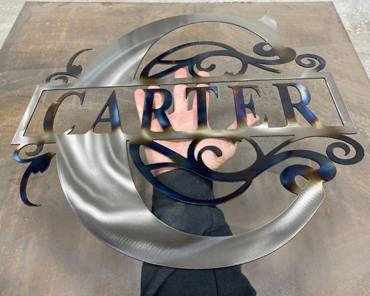 Split Letter Monogram, handcrafted metal family name sign with a heat-treated finish, personalized design, and clear powder coat by CnS CnC.