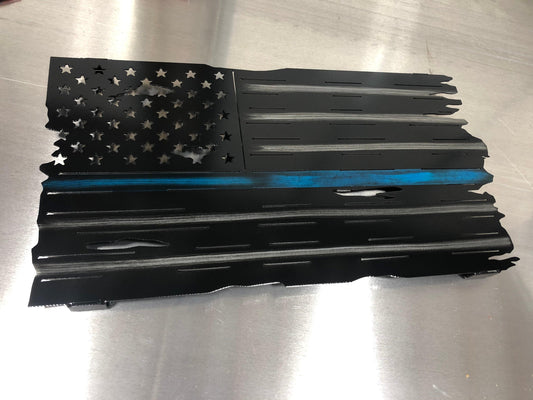 Thin Blue Line Distressed American Flag made from marine-grade aluminum with a weather-resistant finish, designed for police officers and law enforcement.