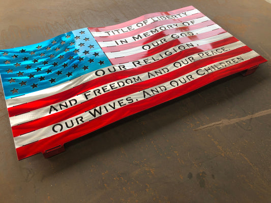 Title of Liberty American Flag, handcrafted from marine-grade aluminum with hand-formed waves and a three-stage powder-coated finish by CnS CnC.