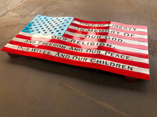 Title of Liberty American Flag, handcrafted from marine-grade aluminum with hand-formed waves and a three-stage powder-coated finish by CnS CnC.